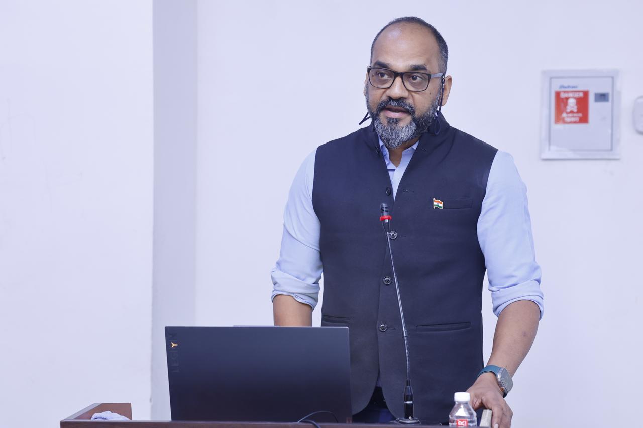 Speaking at podium